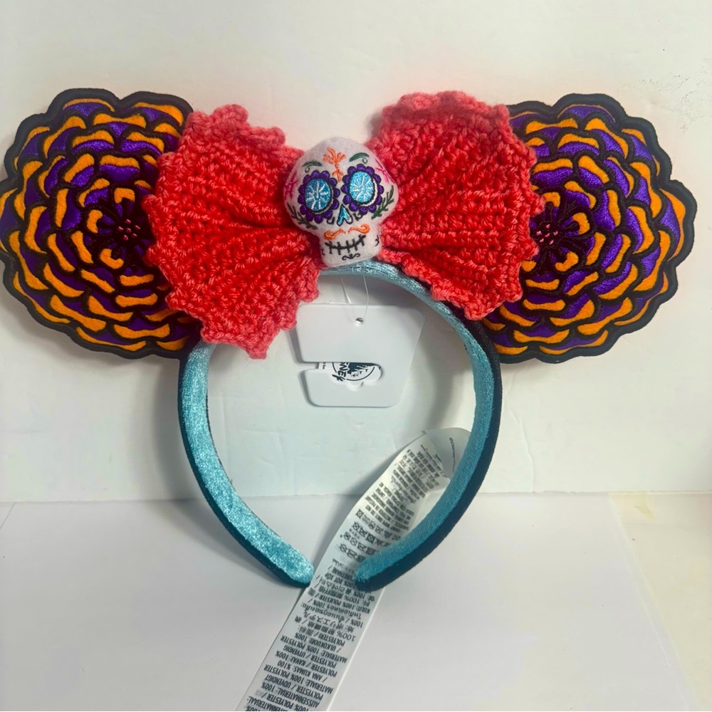 NWT. Disney Parks Coco Minnie Mouse Ear Headband with crochet bow and skull
